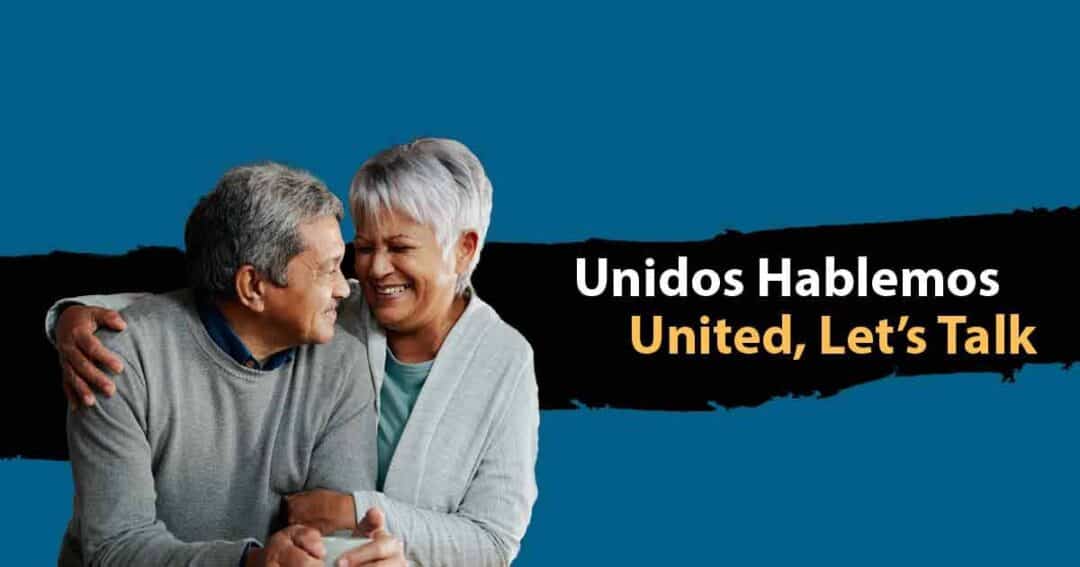 An elderly couple smiles and embraces against a blue background. The text reads, "Unidos Hablemos, United, Let's Talk.