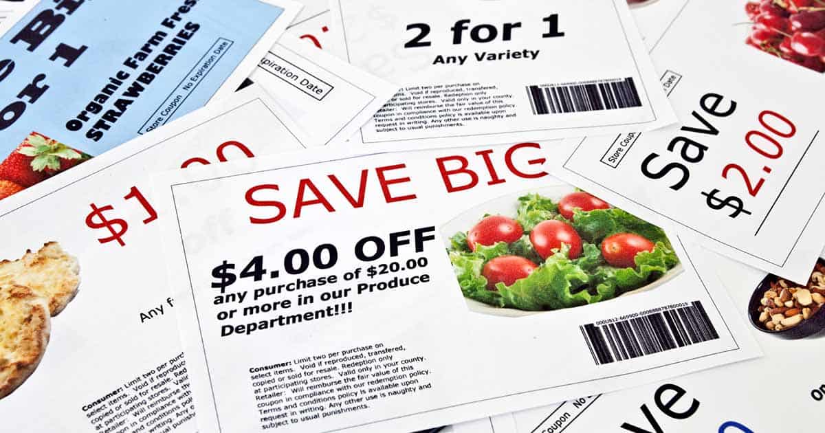 a pile of paper grocery coupons